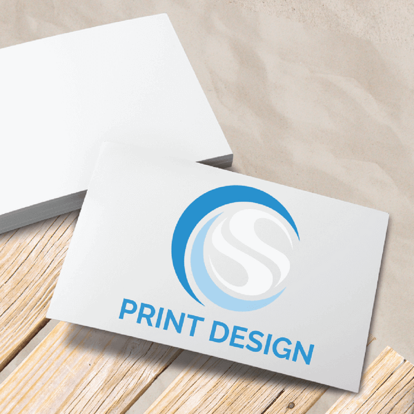 envelopes laying on boardwalk at the beach